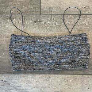 Out from under grey bra cover